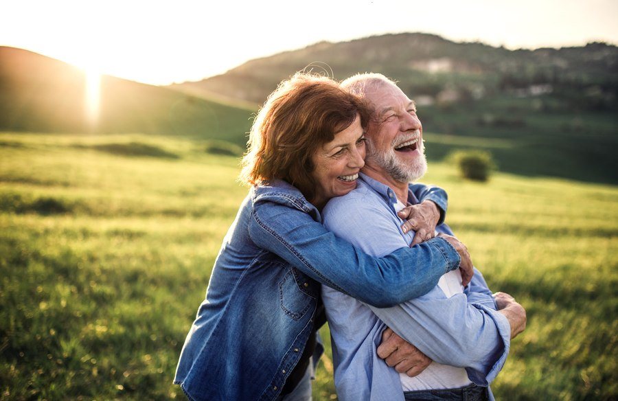 Couple reviewing financial documents together