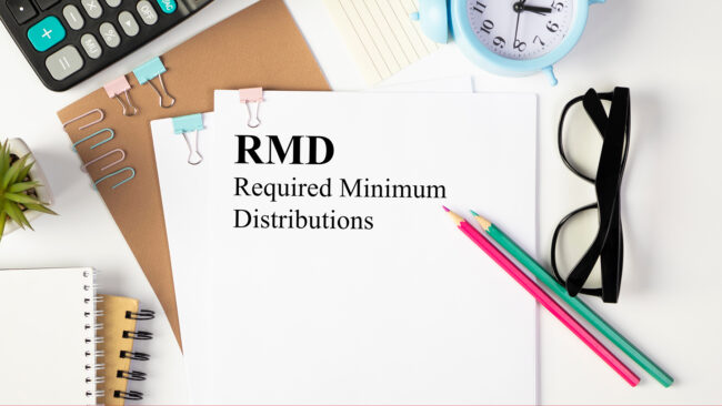 Paper with Required Minimum Distributions RMD on a table