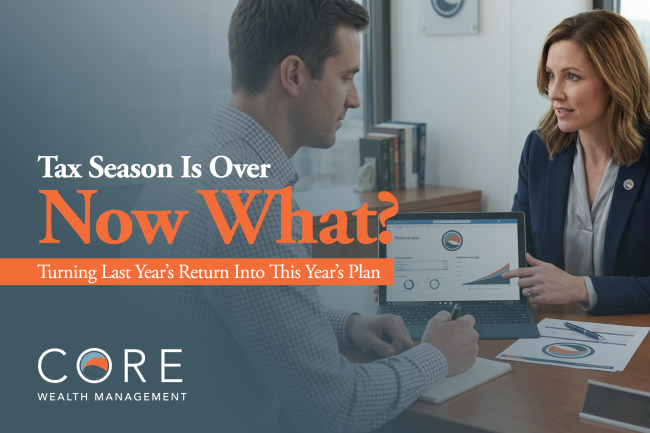 Core Wealth Management Tax-Season-Is-Over—Now-What Jupiter Florida (1) Man and woman financial advisors discussing a "Tax Season Is Over—Now What?" presentation on a screen.